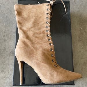 Laced up heeled boots